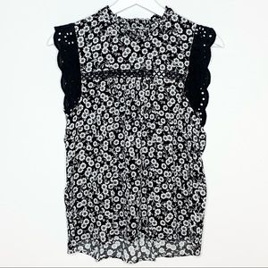 Floral lace shell top in black and white.